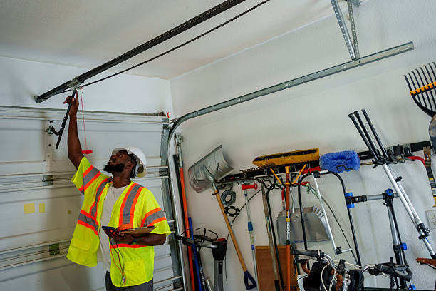 Professional Garage Door Panel Replacement technician working in Suncook, NH